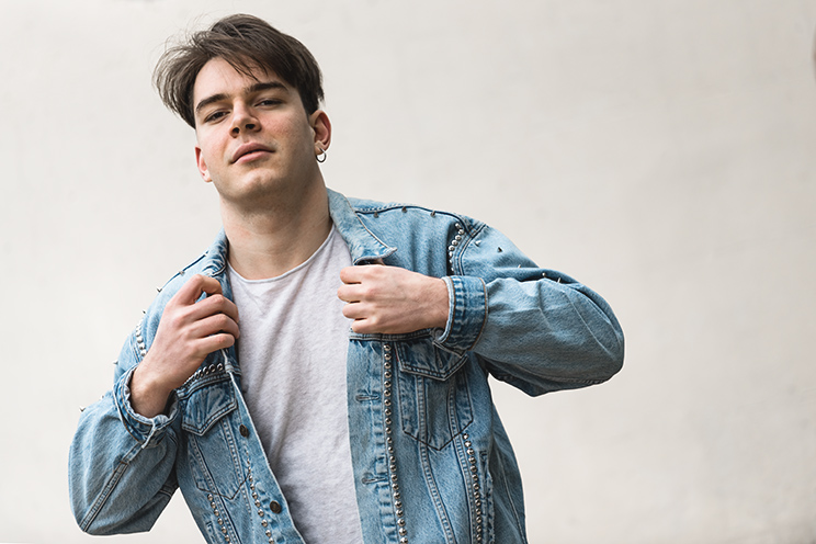 # Ulisse Albiati Photographer: trendy model in a location shooting, dressing a rock and roll denim jacket. The building of Villa Strozzi al Boschetto in Florence, Tuscany.