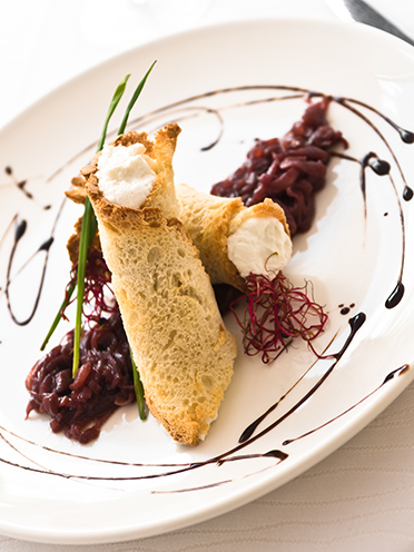# ulisse albiati food photographer: salad cannoli with buffalo ricotta, red onions of Certaldo and balsamic vinegar of Modena as second course. Le Pavoniere restaurant in Florence, Tuscany.