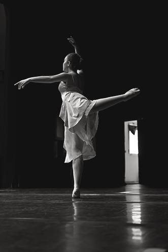 # Ulisse Albiati Photographer: the Attitude is dance position in which a ballerina stands on the supporting leg while the working leg is raised and turned to form an angle of 90 degrees. Danse Arlequin, Rifredi theatre in Florence, Tuscany.