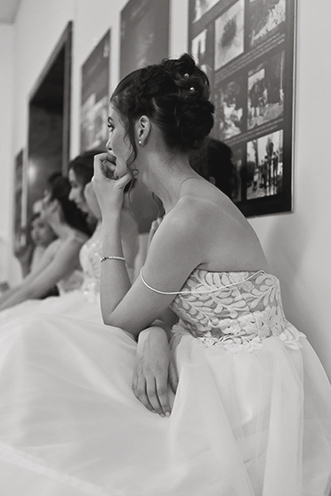 # Ulisse Albiati Photographer: a debutante is a young woman of aristocratic or upper-class family who reaches maturity. Debutante ball, Italian Air Force theater in Florence, Tuscany.