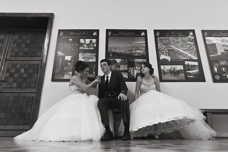 # Ulisse Albiati Photographer: an aviator is a soldier who controls the flight of an aircraft, operating its directional flight control. Debutante ball, Italian Air Force theater in Florence, Tuscany.