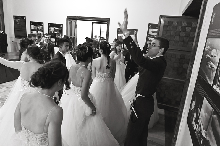 # Ulisse Albiati Photographer: in the UK the last debutante ball were presented at court in 1958, after which the Queen Elizabeth II abolished that ceremony. Debutante ball, Italian Air Force theater in Florence, Tuscany.