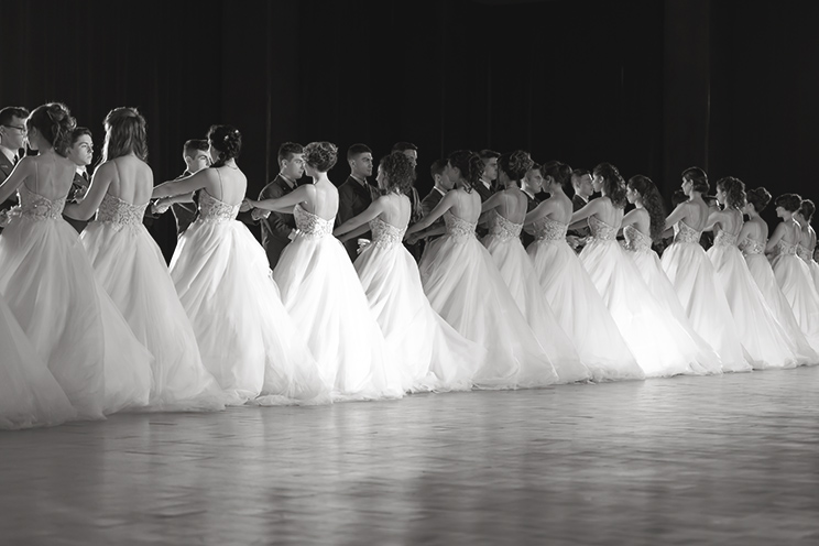 # Ulisse Albiati Photographer: the Vienna Opera Ball is organized in the auditorium of the Vienna State Opera, converted in a wide ballroom for that purpose. Debutante ball, Italian Air Force theater in Florence, Tuscany.